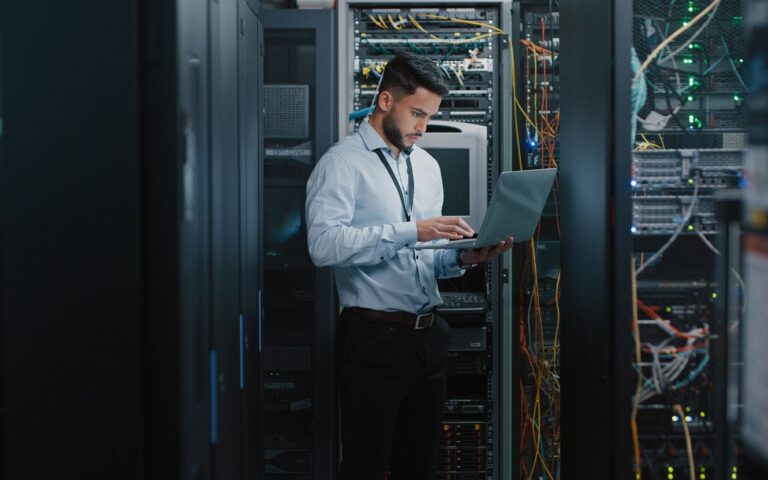 Technician working in a server room